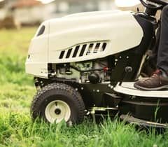 garden tractor mowing lawn