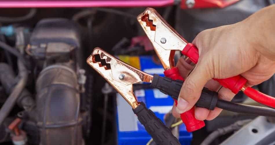 jumper cables and car battery