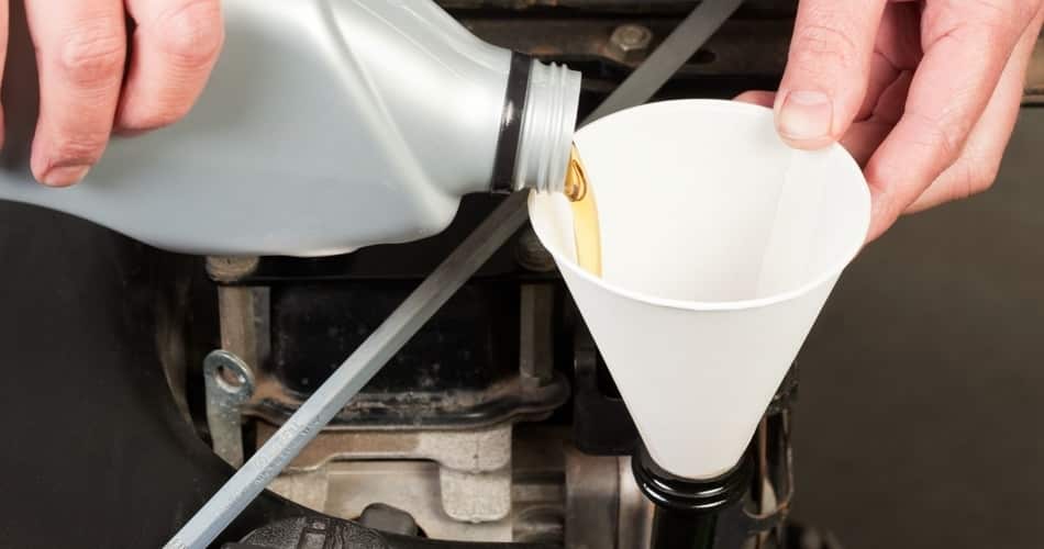 Adding engine oil using a funnel