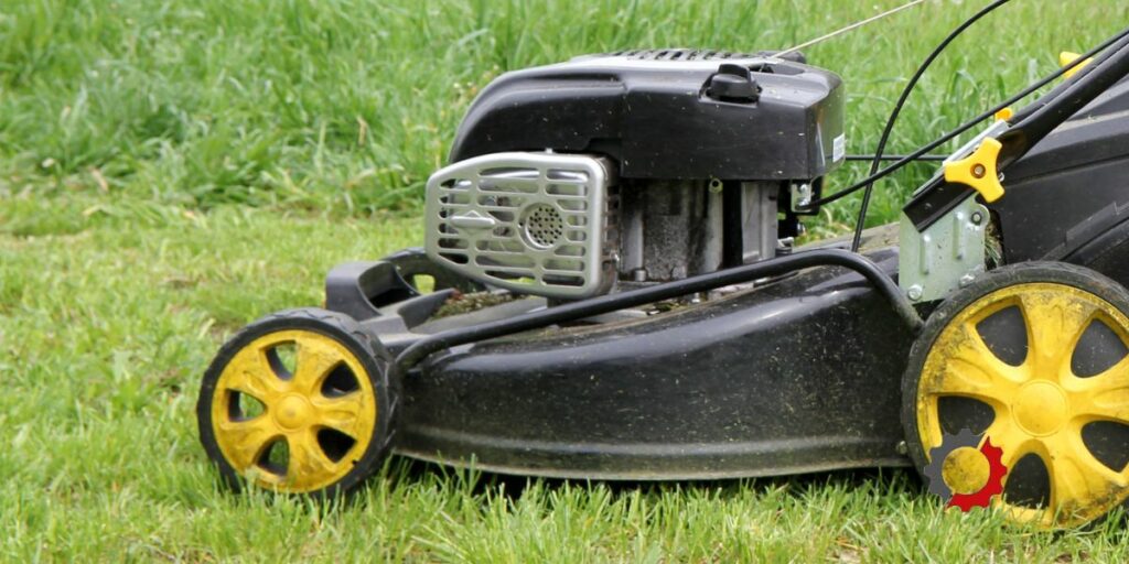 black push mower with yellow wheels