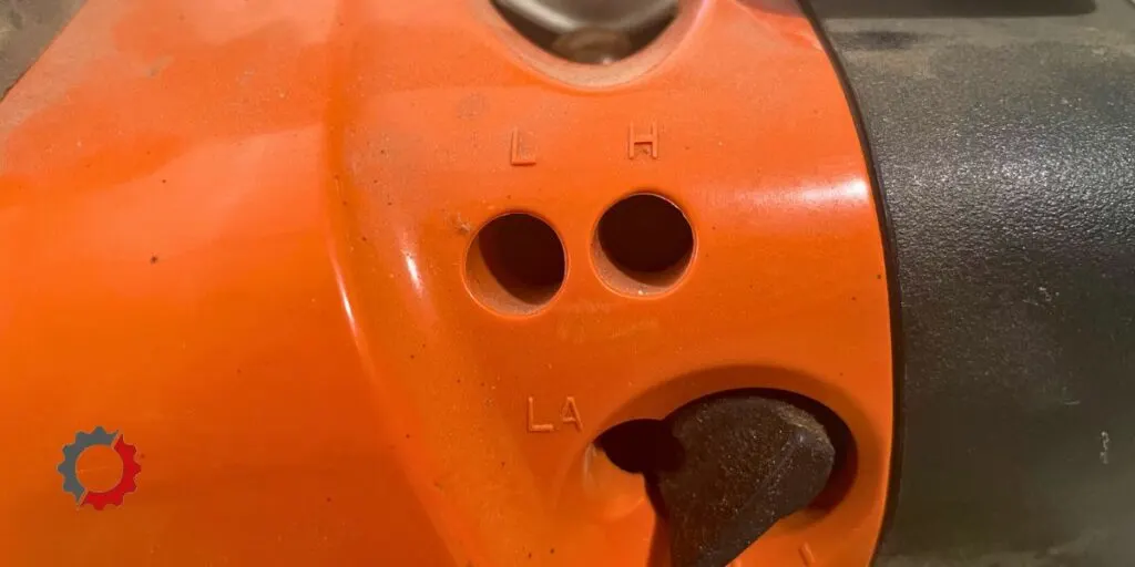 Low, high, and idle STIHL blower carburetor adjustment screws
